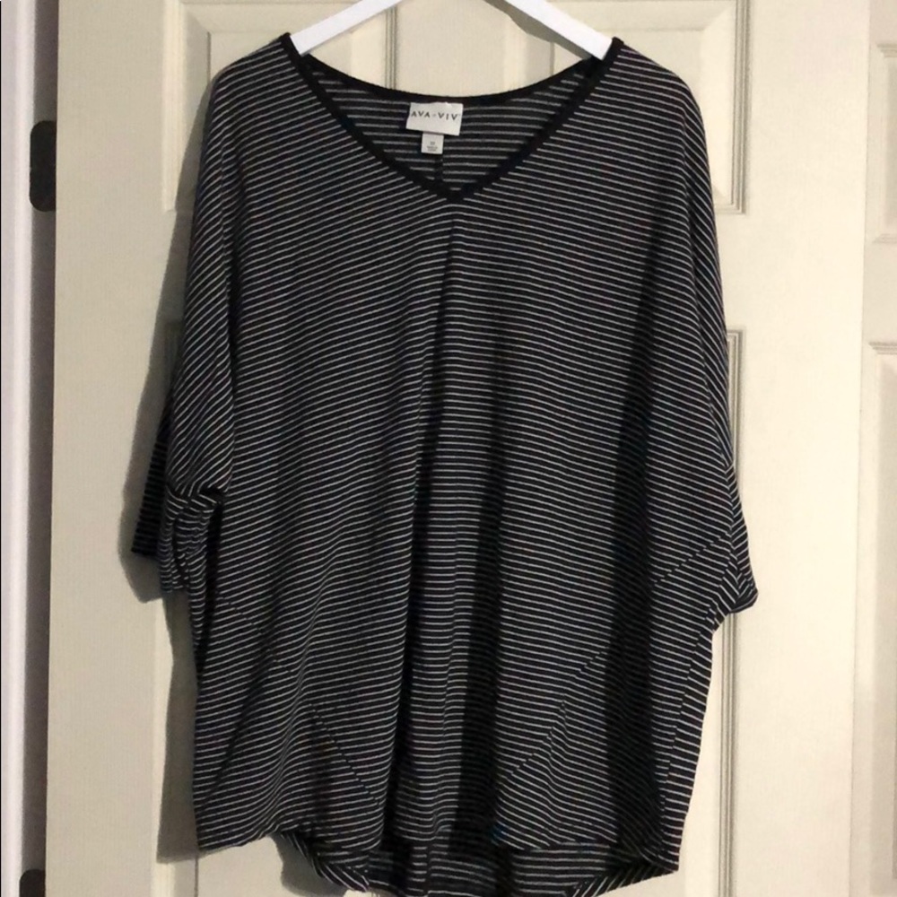 Black and white striped blouse.
